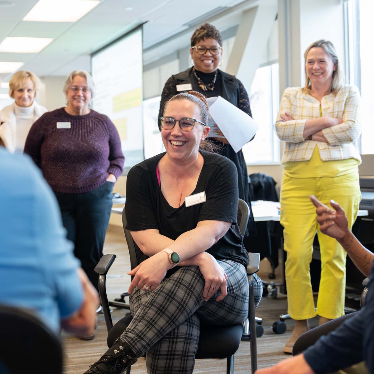 Group activity with employees in a training session.