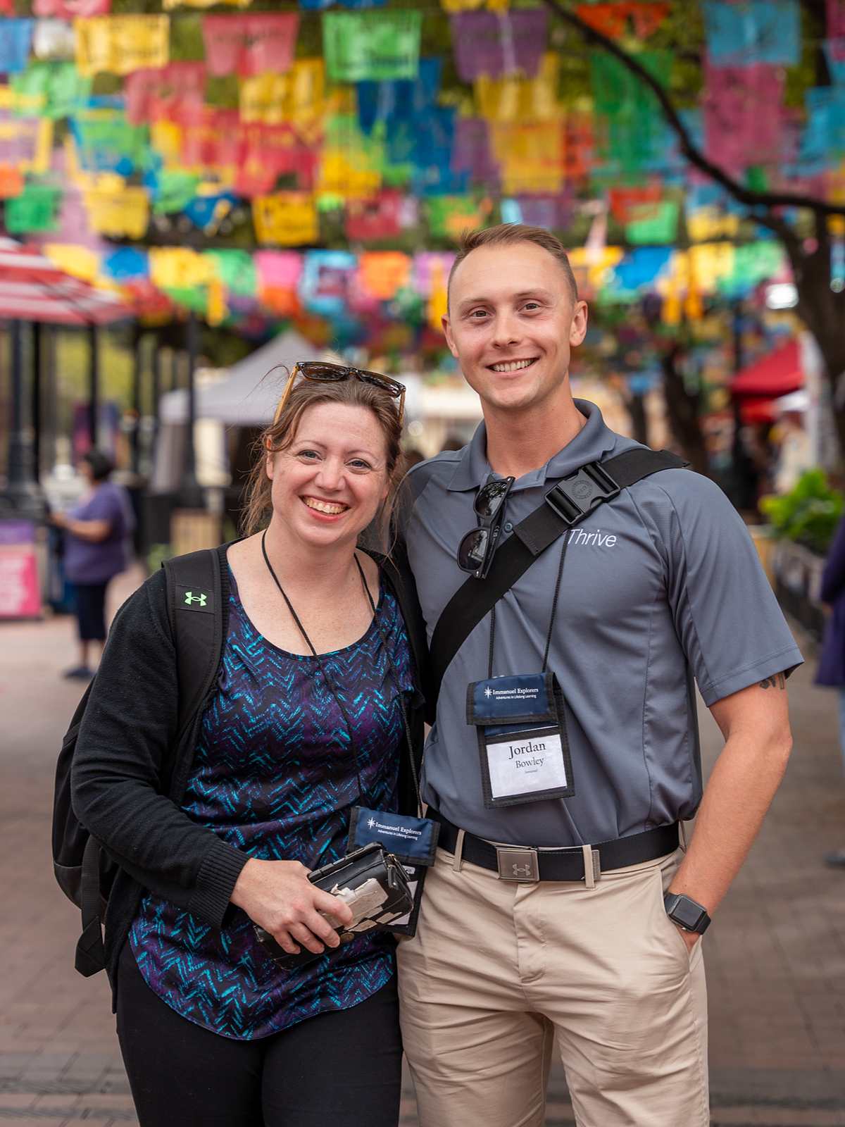 Two Immanuel employees smile wile on an Immanuel Explorers trip. 