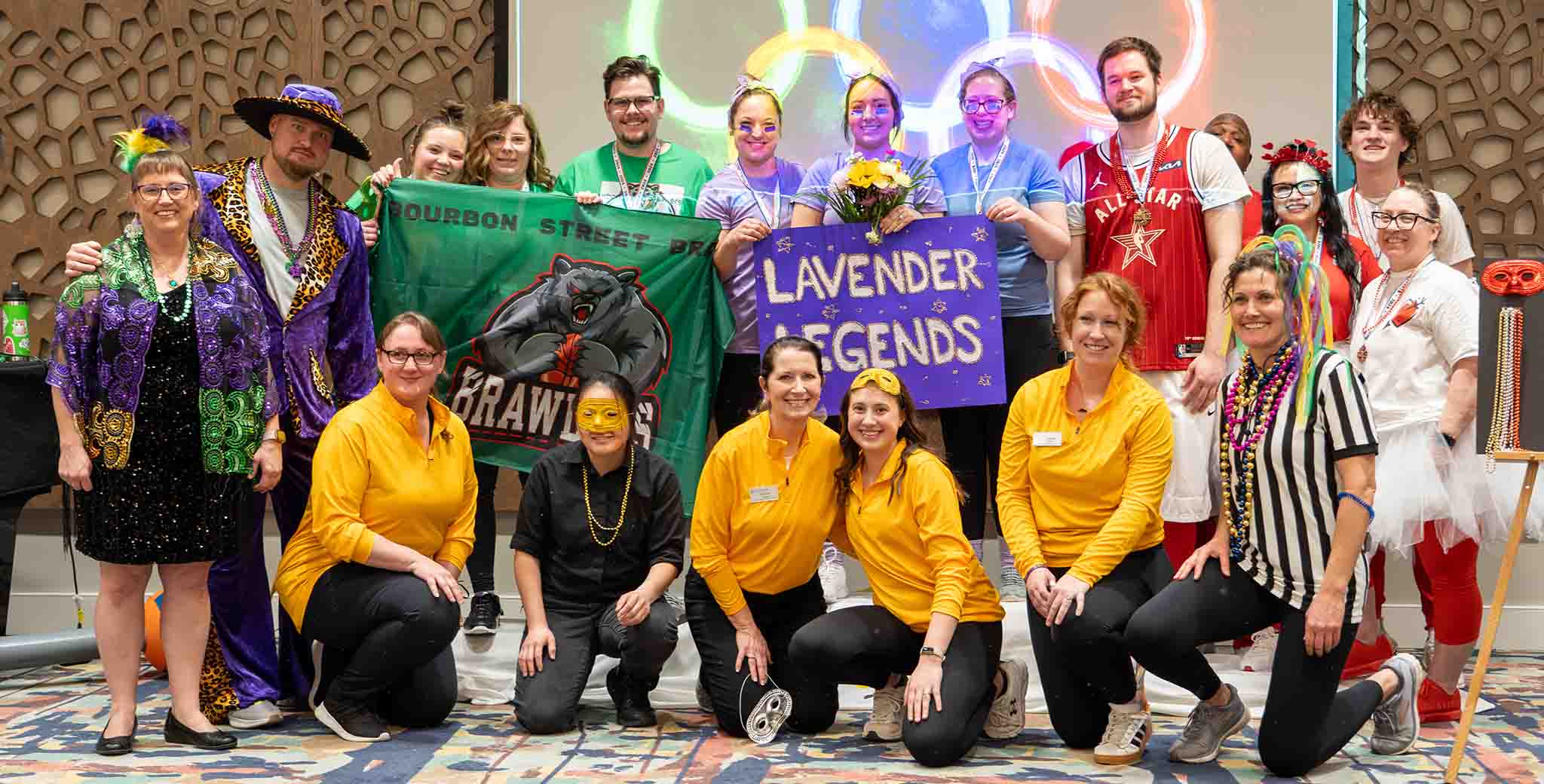 Pacific Springs employees gather for a group photo during a community event.